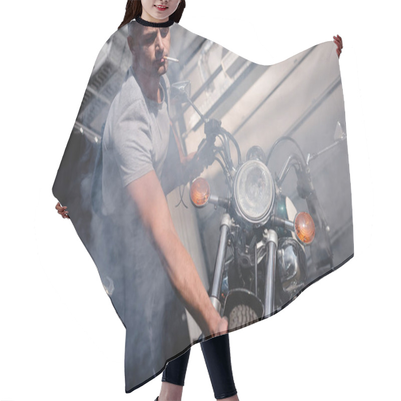 Personality  Guy Smoking Cigarette And Checking Motorbike Front Wheel In Garage Hair Cutting Cape