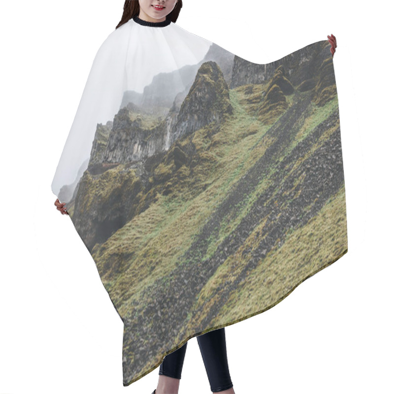 Personality  Dramatic Shot Of Mountain With Green Grass And Rocks In Iceland On Misty Day Hair Cutting Cape