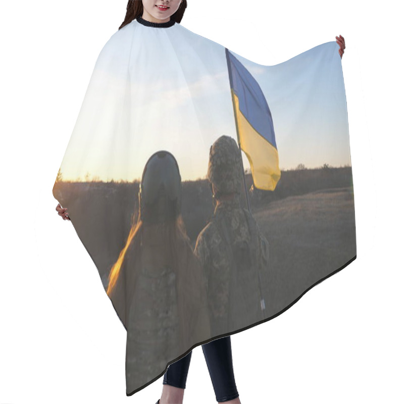 Personality  Soldiers Of Ukrainian Army Raising Flag Of Ukraine Against Background Of Sunset. People In Military Uniform Lifted Up Yellow-blue Flag. Victory Against Russian Aggression. Invasion Resistance Concept. Hair Cutting Cape