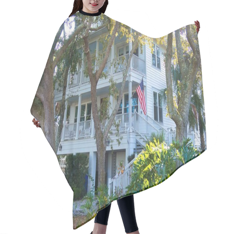 Personality  Charleston, United States - November 5 2022: Old Historic Beach Property With Veranda And American Stars And Stripes Flag Hair Cutting Cape