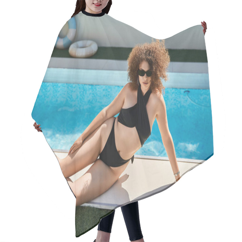 Personality  A Beautiful Woman With Curly Hair Poses In A Black Swimsuit By The Pool On A Sunny Summer Day. Hair Cutting Cape