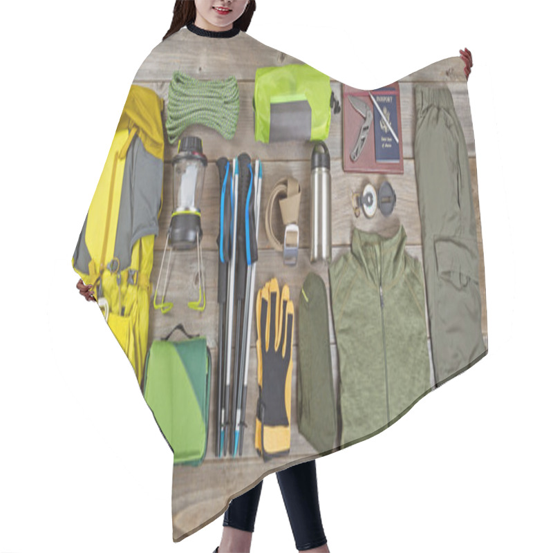 Personality  Hiking And Camping Gear Organized On Rustic Wooden Boards  Hair Cutting Cape