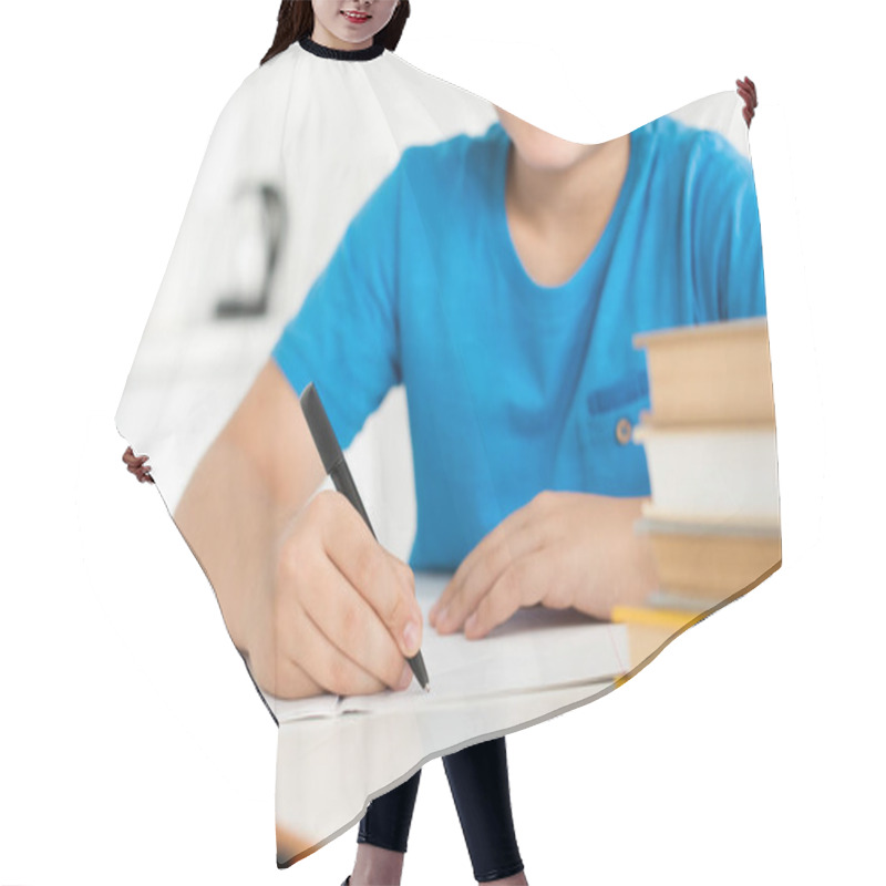 Personality  Partial View Of Boy Writing In Copybook While Doing Homework At Home Hair Cutting Cape