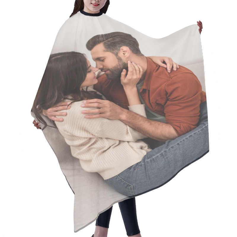 Personality  Side View Of Young Couple Kissing And Embracing On Couch  Hair Cutting Cape