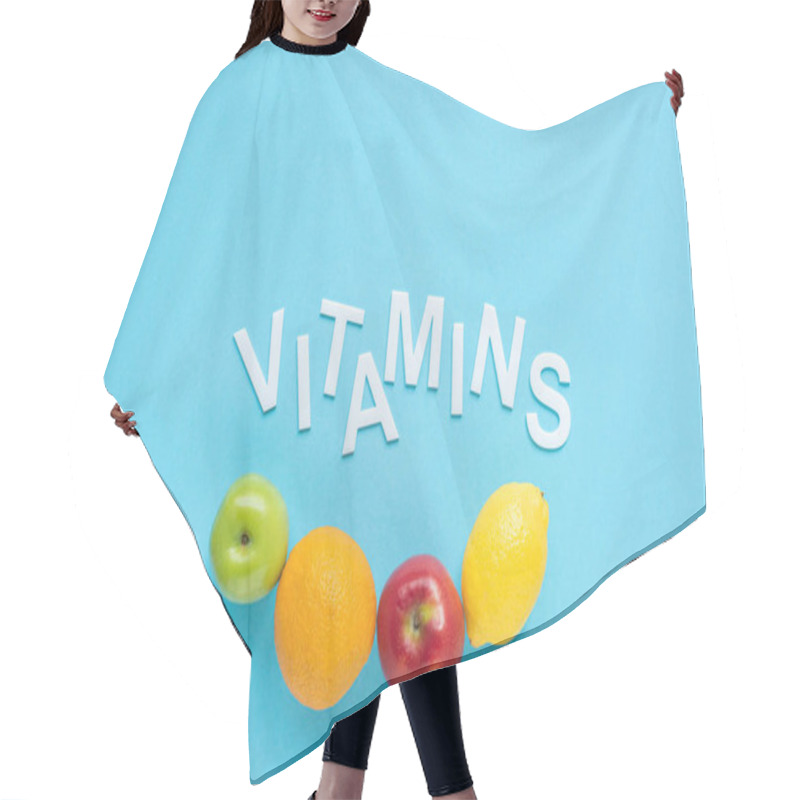 Personality  Top View Of Ripe Fruits And Word Vitamins On Blue Background Hair Cutting Cape