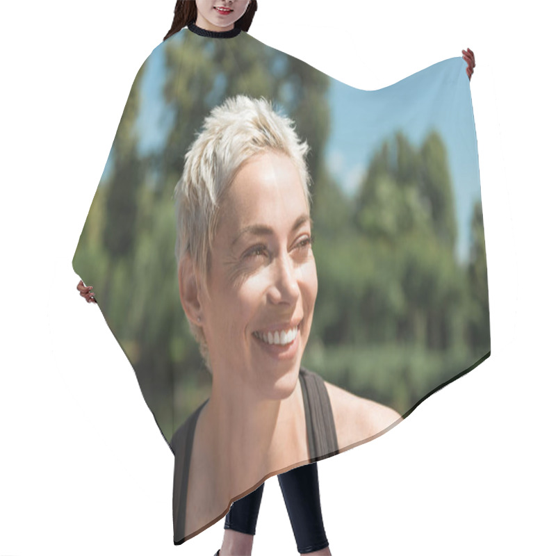 Personality  Portrait Of Beautiful Smiling Woman Looking Away In Park Hair Cutting Cape