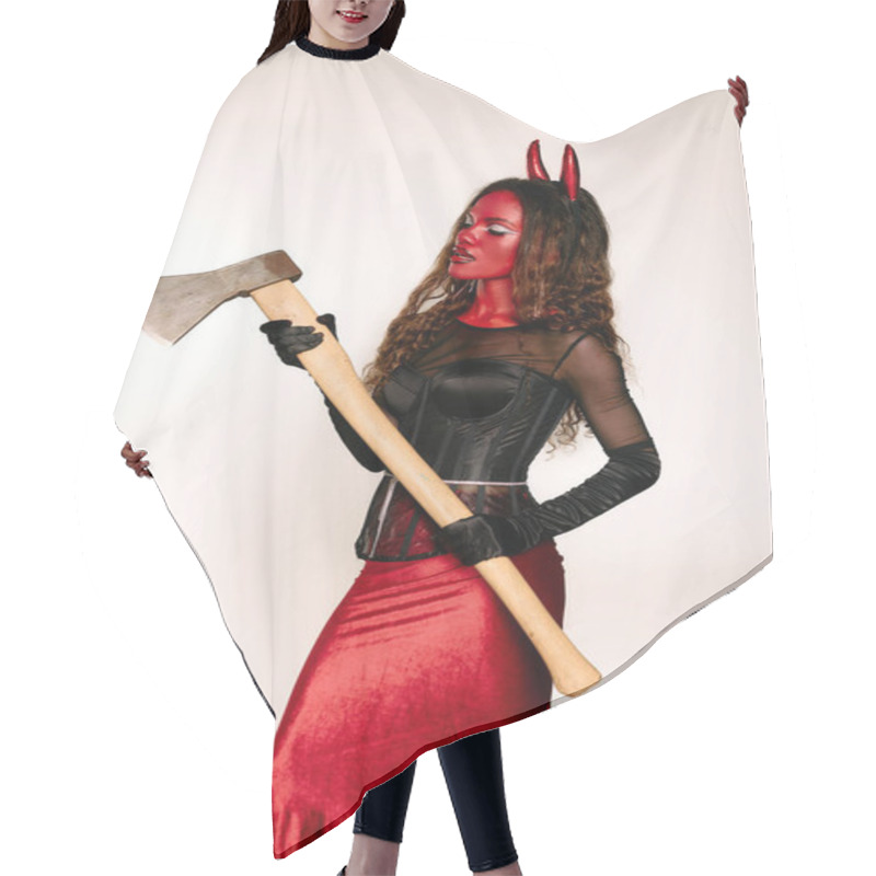 Personality  A Stunning Woman In A Devil Costume Wields A Large Axe At Halloween Festivities. Hair Cutting Cape