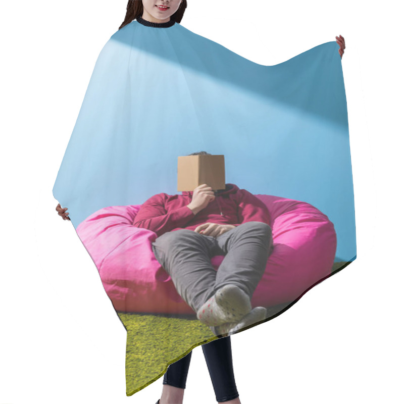 Personality  Man Reading Book In Bean Bag In Front Of Blue Wall Hair Cutting Cape