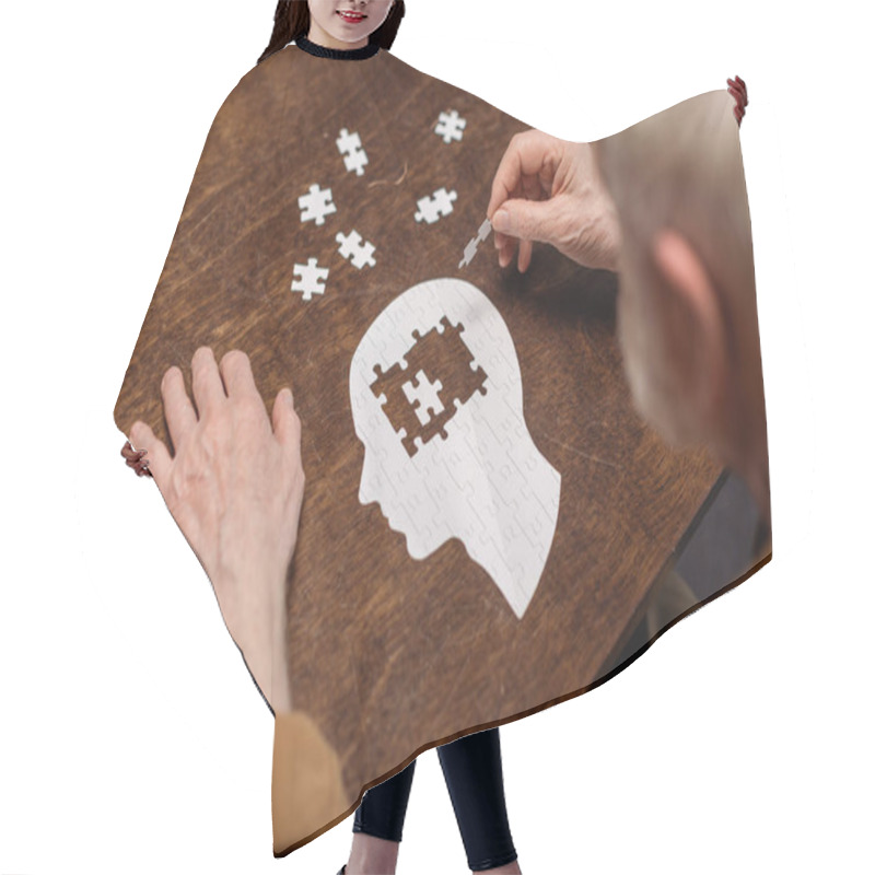 Personality  High Angle View Of Senior Man Collecting Jigsaw Puzzle As Dementia Rehab Hair Cutting Cape