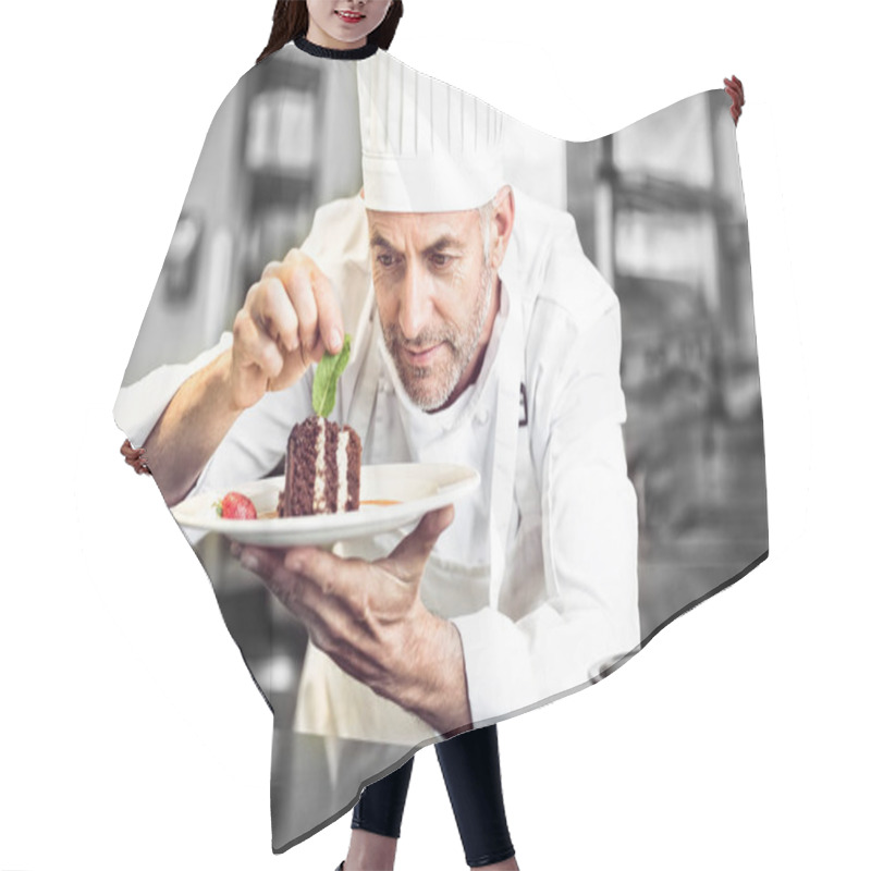 Personality  Concentrated Male Pastry Chef Decorating Dessert In Kitchen Hair Cutting Cape