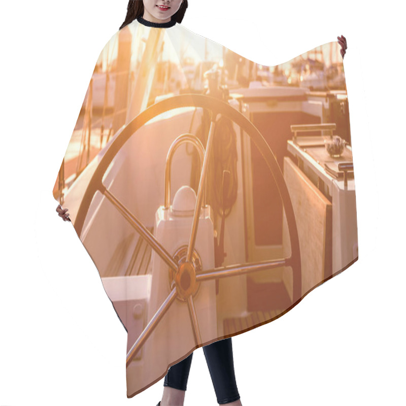 Personality  A Modern Speed Boat Yacht Steering Wheels. Background Hair Cutting Cape