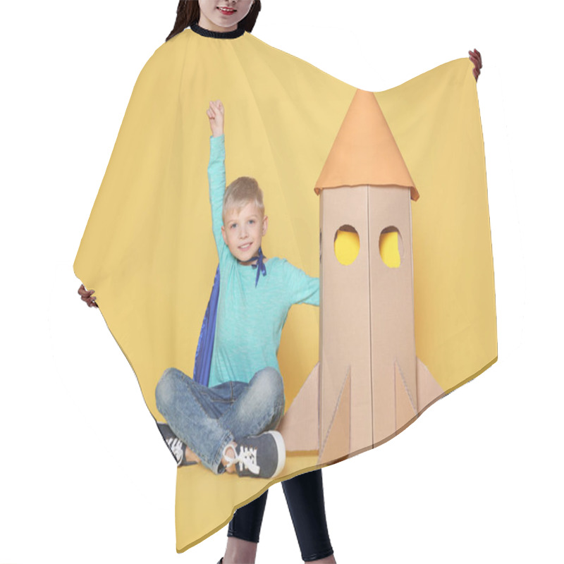 Personality  Little Child In Cape Playing With Rocket Made Of Cardboard Box On Yellow Background Hair Cutting Cape