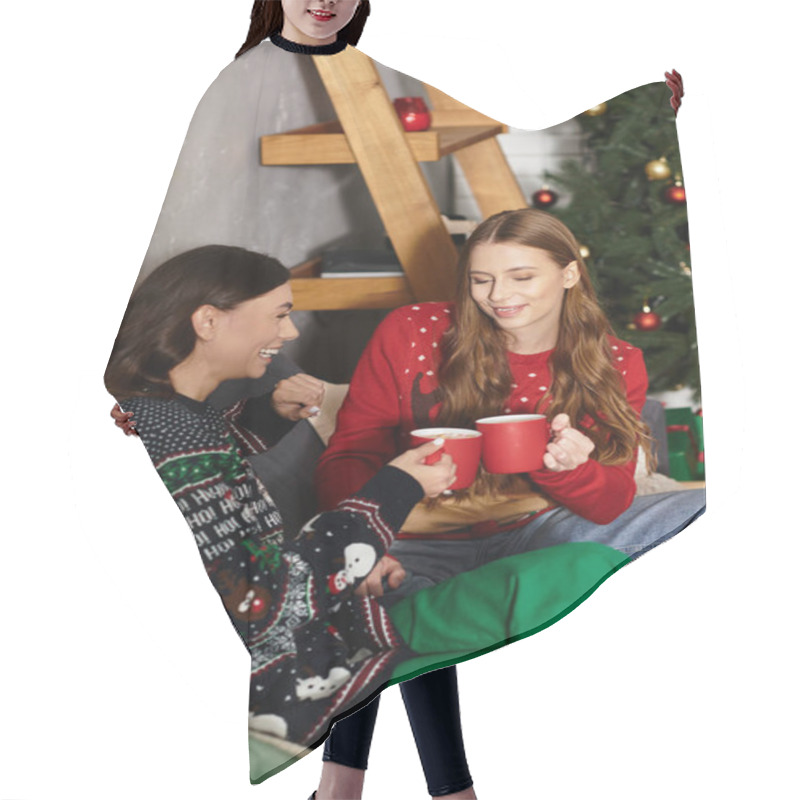 Personality  Two Girlfriends Enjoy Warm Beverages Together, Surrounded By Christmas Decorations And Holiday Cheer. Hair Cutting Cape