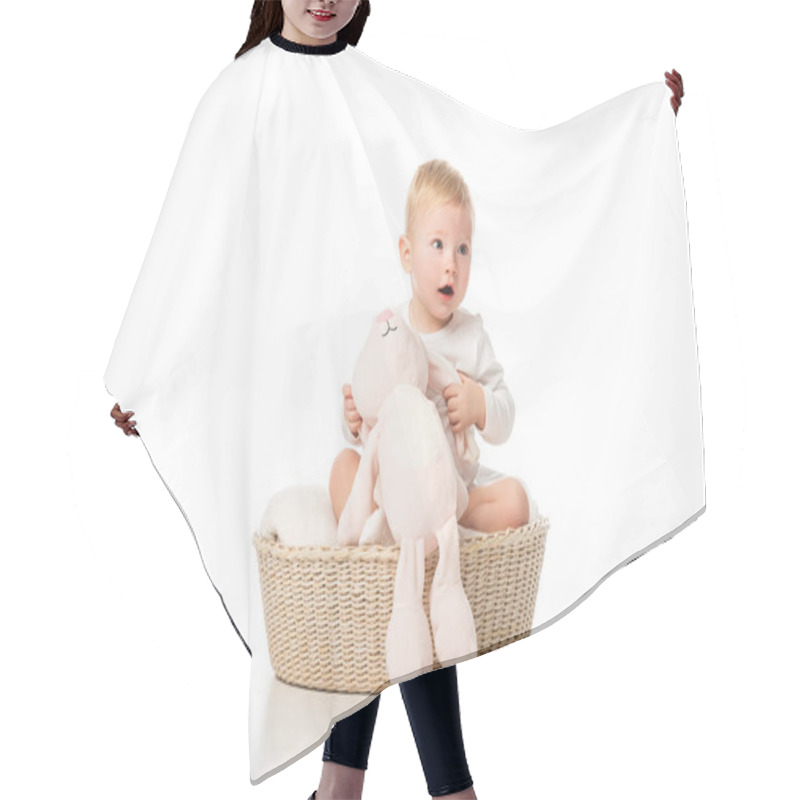 Personality  Cute Child With Open Mouth Holding Pink Bunny And Sitting In Basket On White Background Hair Cutting Cape