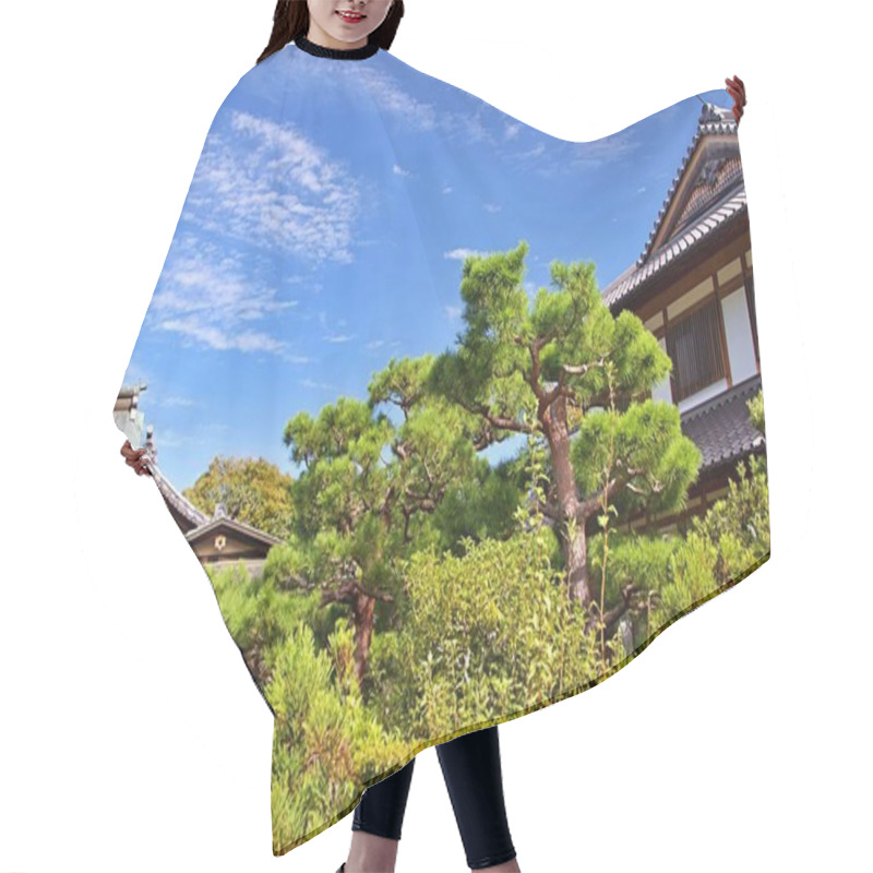 Personality  A Serene Photograph Of A Traditional Japanese Temple Surrounded By Lush Greenery And A Beautifully Landscaped Zen Garden. A Tranquil Stone Path Leads Through The Garden, Creating A Peaceful And Harmonious Atmosphere. Hair Cutting Cape