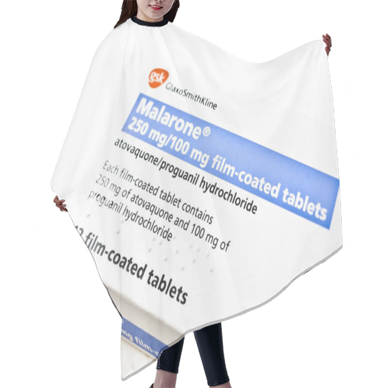 Personality  EDINBURGH, SCOTLAND JANUARY 11, 2014: Malarone Anti-malarial Tablets Hair Cutting Cape