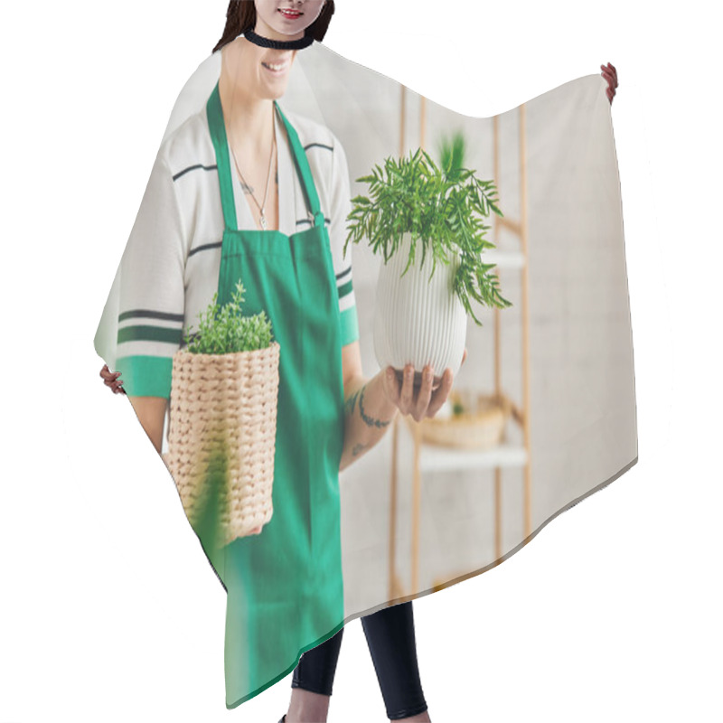 Personality  Indoor Gardening, Partial View Of Happy Tattooed Woman In Green Apron Holding Flowerpots With Houseplants In Modern Living Room, Blurred Foreground, Sustainable Home Decor And Green Living Concept Hair Cutting Cape