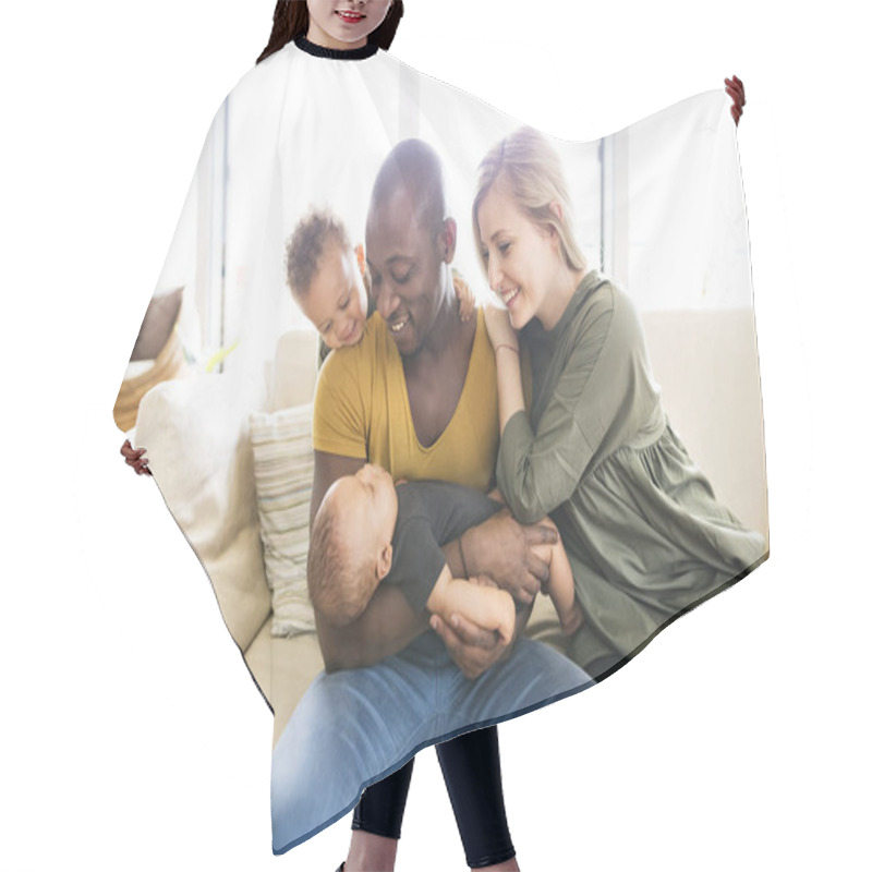 Personality  Young Interracial Family With Little Children At Home. Hair Cutting Cape