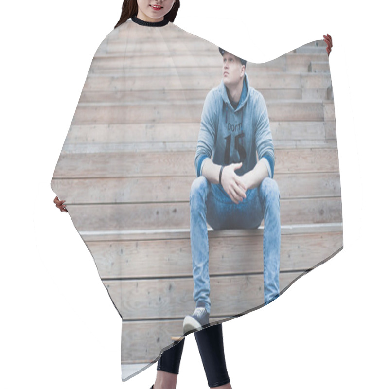 Personality  Attractive Young Man Sitting On Wooden Steps In An Urban City Park With His Skating Board Hair Cutting Cape