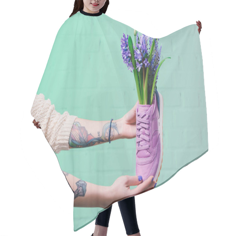 Personality  Cropped Image Of Girl Holding Shoe With Hyacinth Flowers Hair Cutting Cape