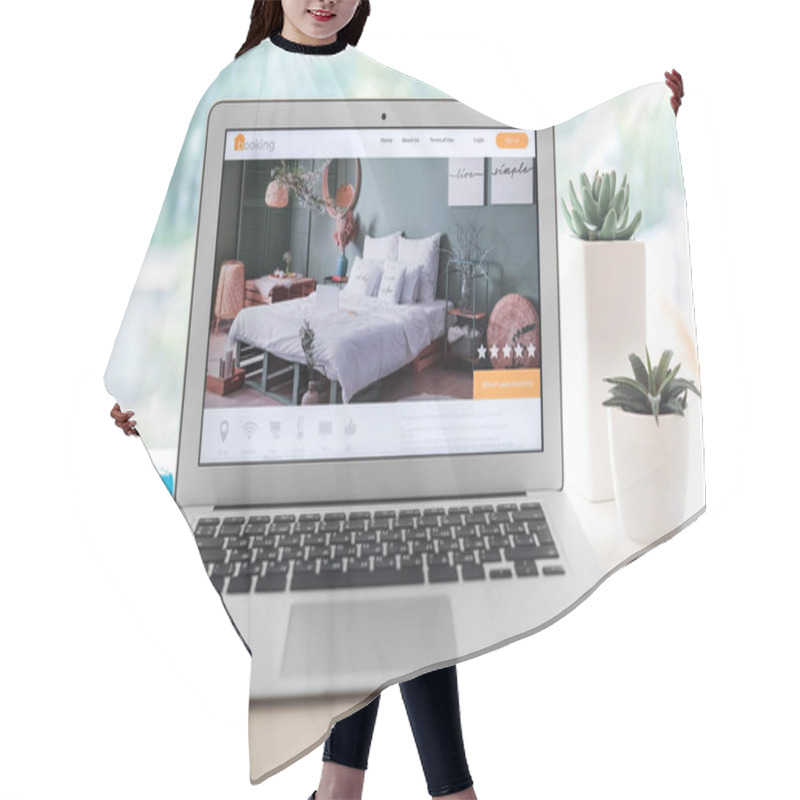 Personality  Open Page Of Online Booking Service On Screen Of Laptop On Table Hair Cutting Cape