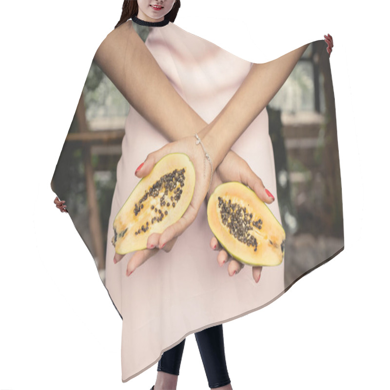 Personality  Cropped View Of Young African American Woman In Summer Dress Holding Fresh Papaya And Standing In Blurred Indoor Garden, Trendy Woman Surrounded By Tropical Lushness Hair Cutting Cape