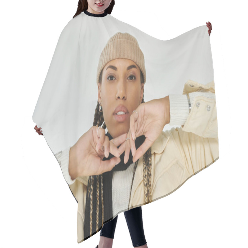 Personality  Good Looking African American Woman In Autumn Stylish Attire On White Backdrop. Hair Cutting Cape