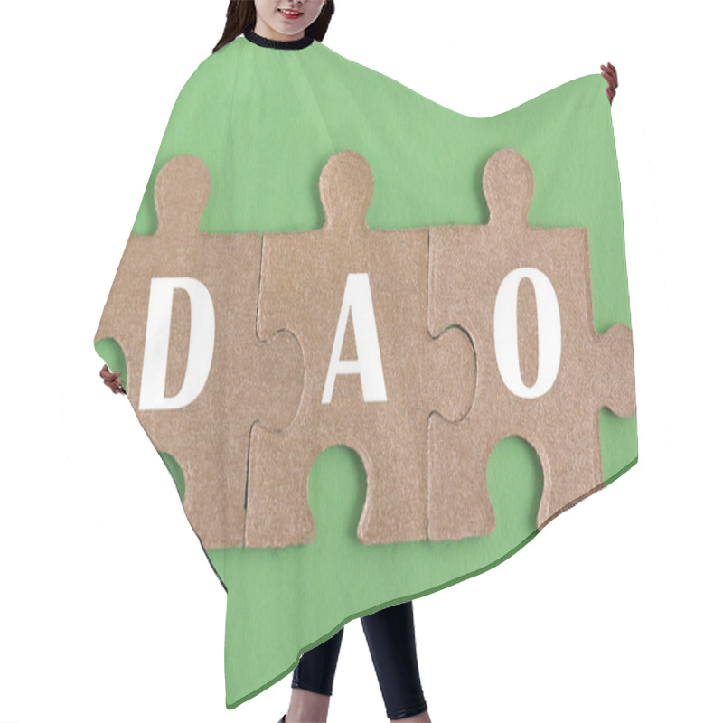 Personality  Decentralized Autonomous Organization. Puzzle, Word DAO, On Green Background Hair Cutting Cape