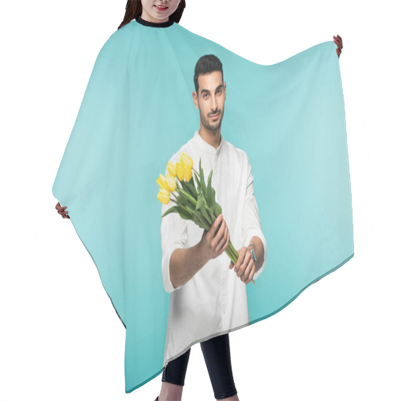 Personality  Muslim Man In White Shirt Holding Flowers Isolated On Blue  Hair Cutting Cape