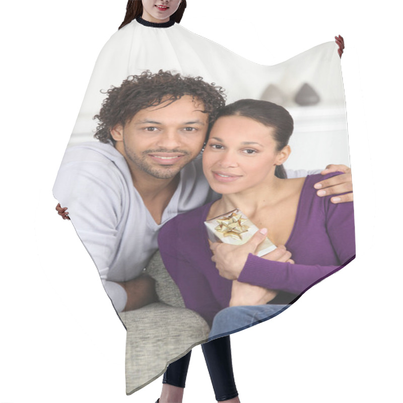 Personality  Man Giving His Girlfriend A Gift On The Sofa Hair Cutting Cape