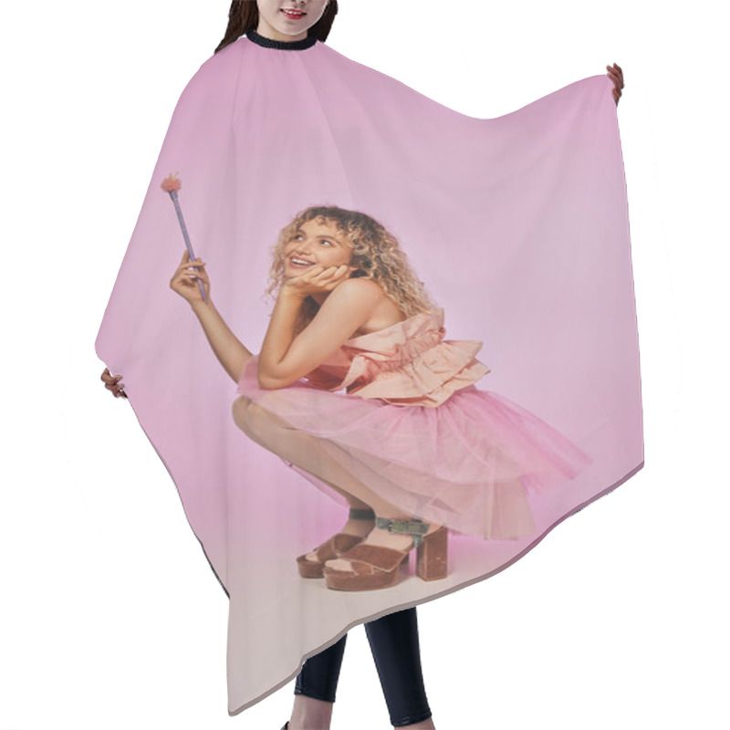 Personality  Pretty Woman In Tooth Fairy Costume With Magic Wand In Hands Squatting And Posing On Pink Backdrop Hair Cutting Cape