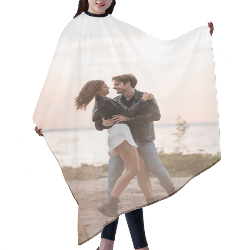 Personality  Selective Focus Of Man In Leather Jacket Embracing Girlfriend On Beach At Sunset  Hair Cutting Cape