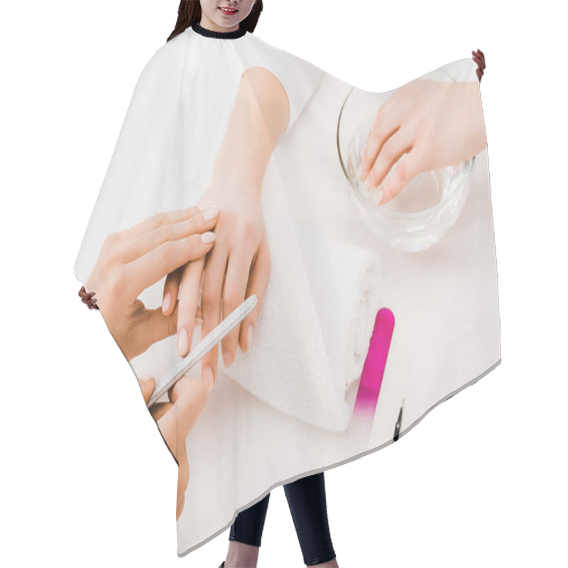 Personality  Partial View Of Manicurist Holding Fingers And Making Nail Form  Hair Cutting Cape