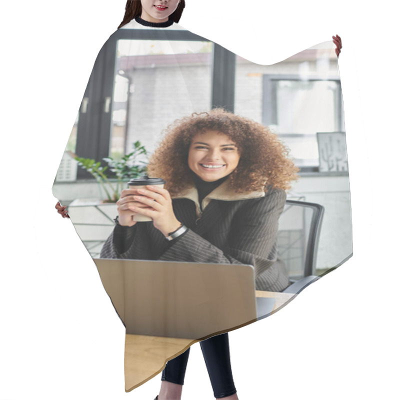 Personality  A Cheerful Woman Smiles Brightly While Holding A Coffee Cup In A Stylish Office Setting. Hair Cutting Cape