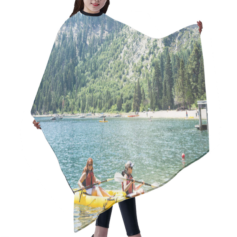 Personality  Two Female Friends Row In A Dual Kayak On Lake Tahoe In Emerald Bay. Concept For Teamwork, Female Friendship, Working Together Hair Cutting Cape