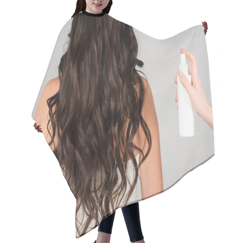 Personality  Cropped View Of Hair Stylist Holding Spray Bottle Near Brunette Woman With Curly Hair Isolated On Grey  Hair Cutting Cape