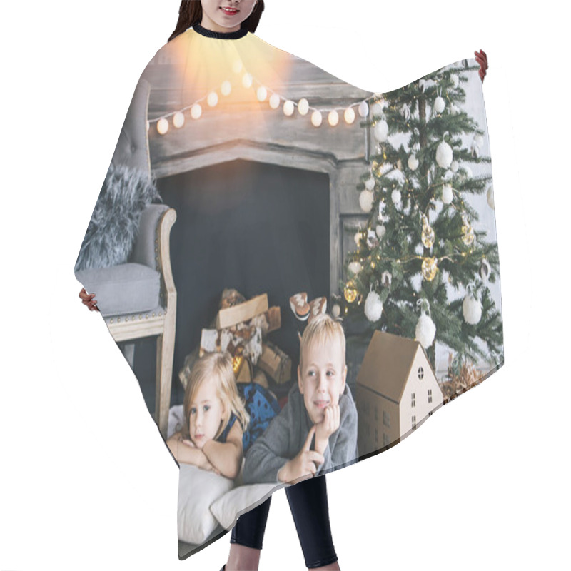 Personality  Children - A Boy And A Girl Are Lying By The Fireplace, Christmas Tree And Cardboard Houses, Cozy Christmas Decor And Children's Emotions Hair Cutting Cape