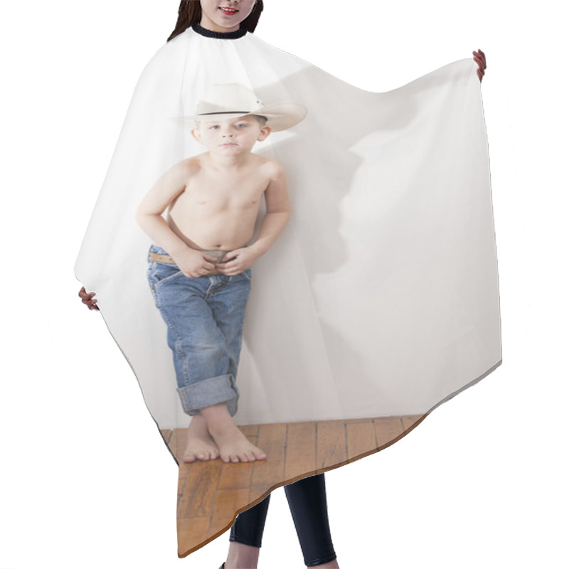 Personality  Full Length Image Of Caucasian Little Boy In Cowboy Hat And Jeans Hair Cutting Cape