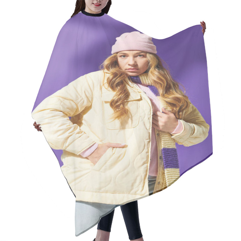 Personality  A Young Beautiful Plus Size Woman Poses Against A Purple Background Wearing Cozy Winter Clothes. Hair Cutting Cape