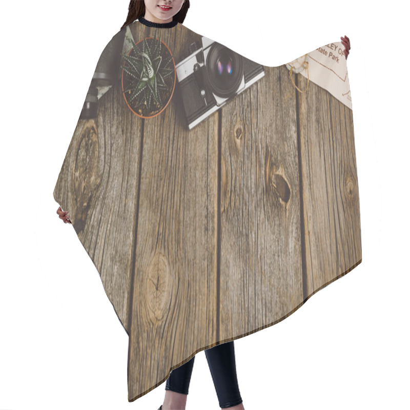 Personality  Travel Accessories Top View On Wooden Background With Copy Space Hair Cutting Cape