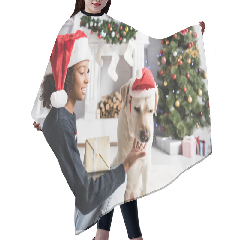 Personality  Smiling African American Girl Stroking Labrador Dog While Holding Gift Box On Blurred Background Hair Cutting Cape