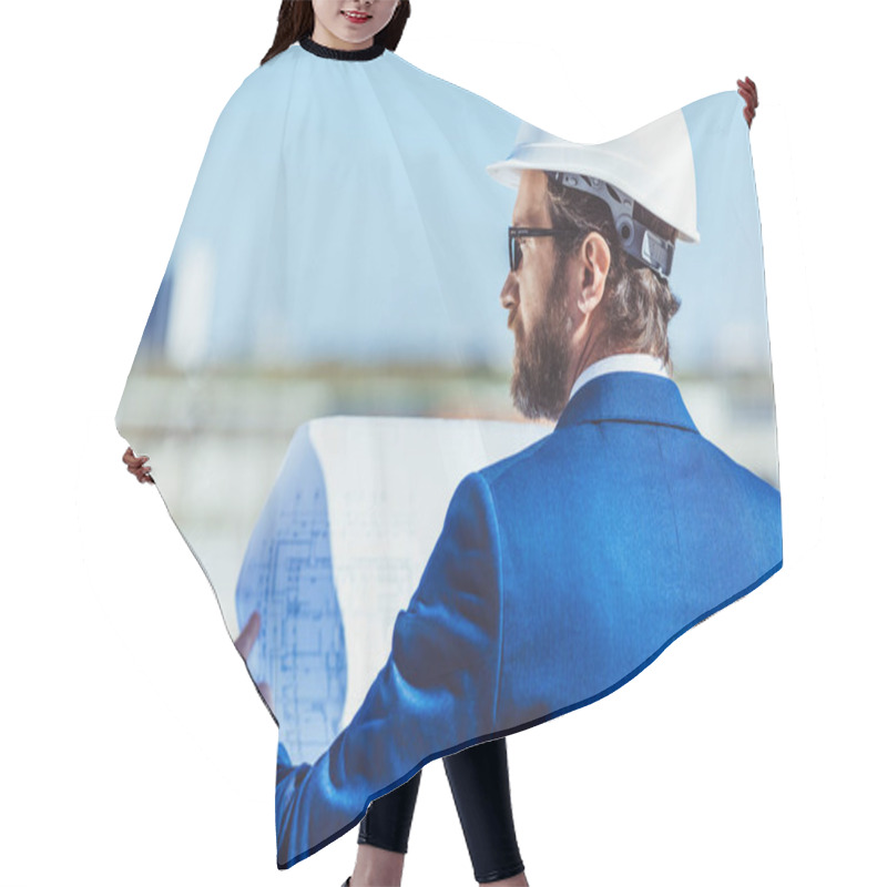 Personality  Businessman In Hardhat Examining Building Plans Hair Cutting Cape