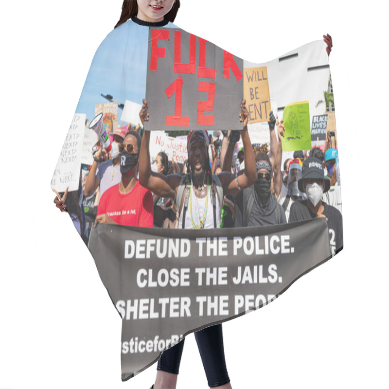 Personality  Miami Downtown, FL, USA - MAY 31, 2020: Protesters Gather In Downtown Miami. Protests For George Floyd. Defund The Police Sign. Justice Requirements For Black People. Hair Cutting Cape