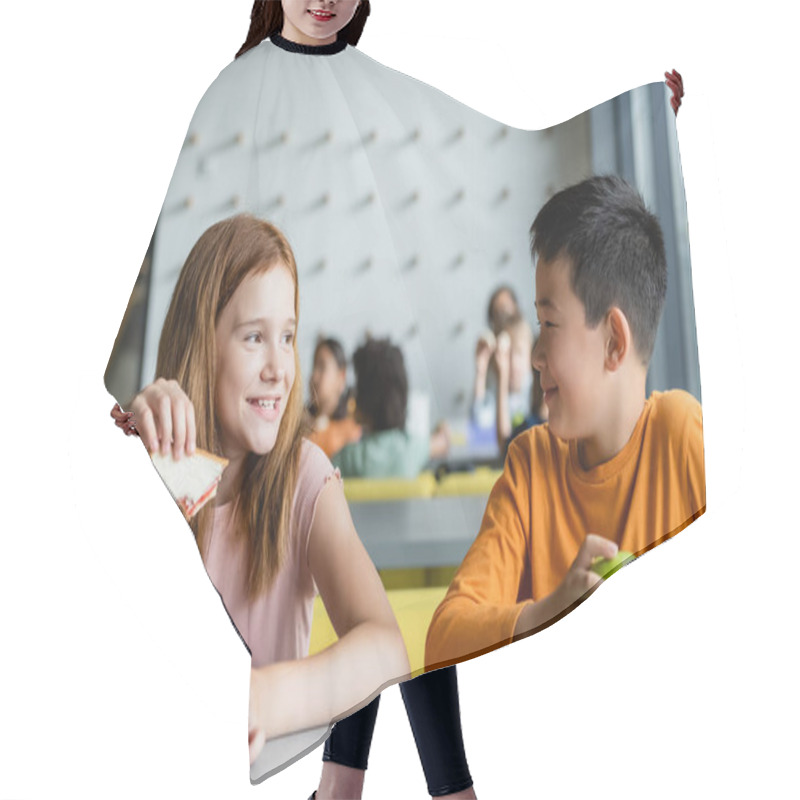 Personality  Redhead Girl With Sandwich Smiling To Asian Boy In School Dining Room Hair Cutting Cape