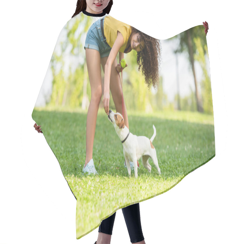 Personality  Selective Focus Of Young Woman Touching Dog And Holding Tennis Ball Hair Cutting Cape