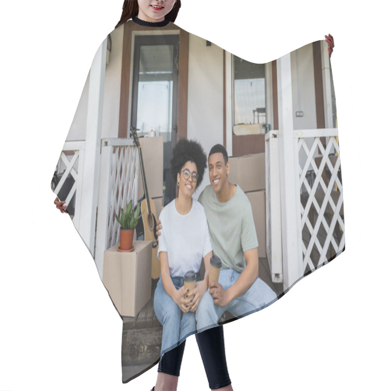 Personality  Happy African American Couple Holding Takeaway Coffee And Hugging On Porch Of New Home Hair Cutting Cape