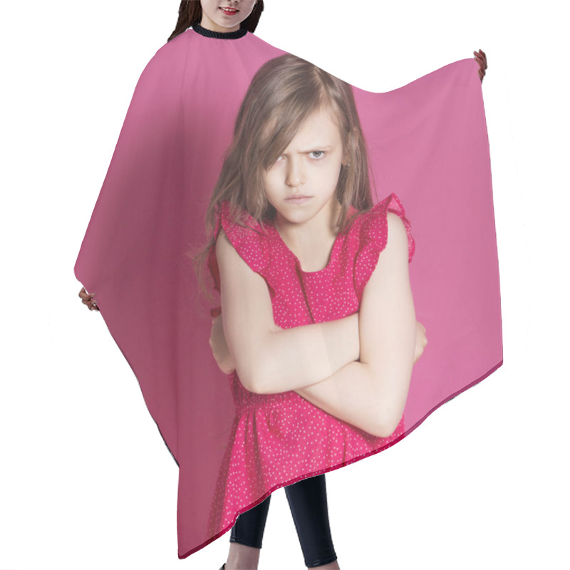 Personality  Little 8 Years Old Girl Make Some Emotional Gesture With Her Hands On A Pink Neutral Background. She Has Long Brunette Hair And Wear Red Summer Dress. Funny Expression On Her Face Hair Cutting Cape