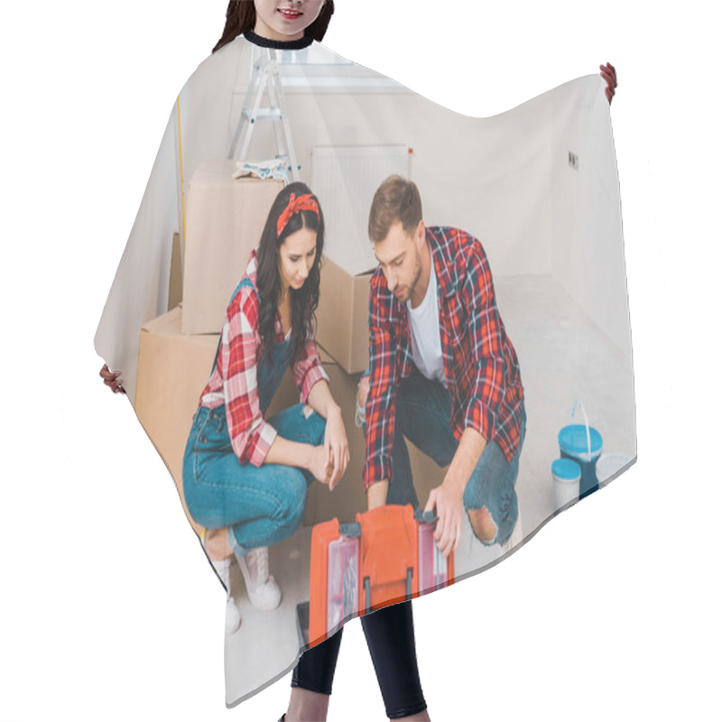 Personality  Man And Woman Sitting And Looking At Toolbox At Home Hair Cutting Cape