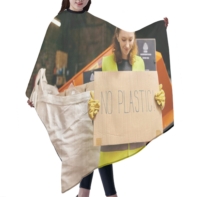 Personality  A Young Volunteer In Gloves And Safety Vest Holding A Sign That Reads No Plastic At A Waste Sorting Event. Hair Cutting Cape