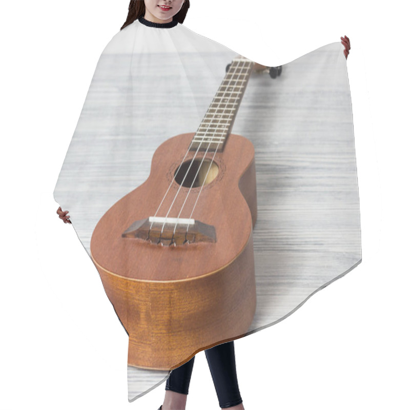 Personality  Close Up Of Ukulele On Old Wooden Background Hair Cutting Cape